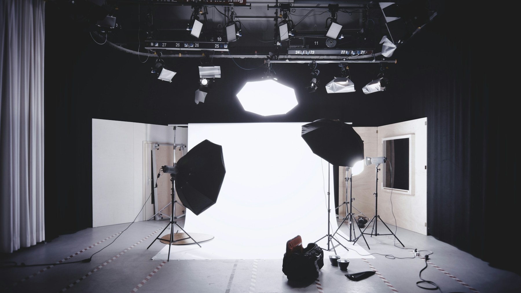 A studio camera and lighting setup prepared for production.
